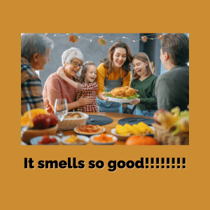 Family gathered around a table with delicious food being served